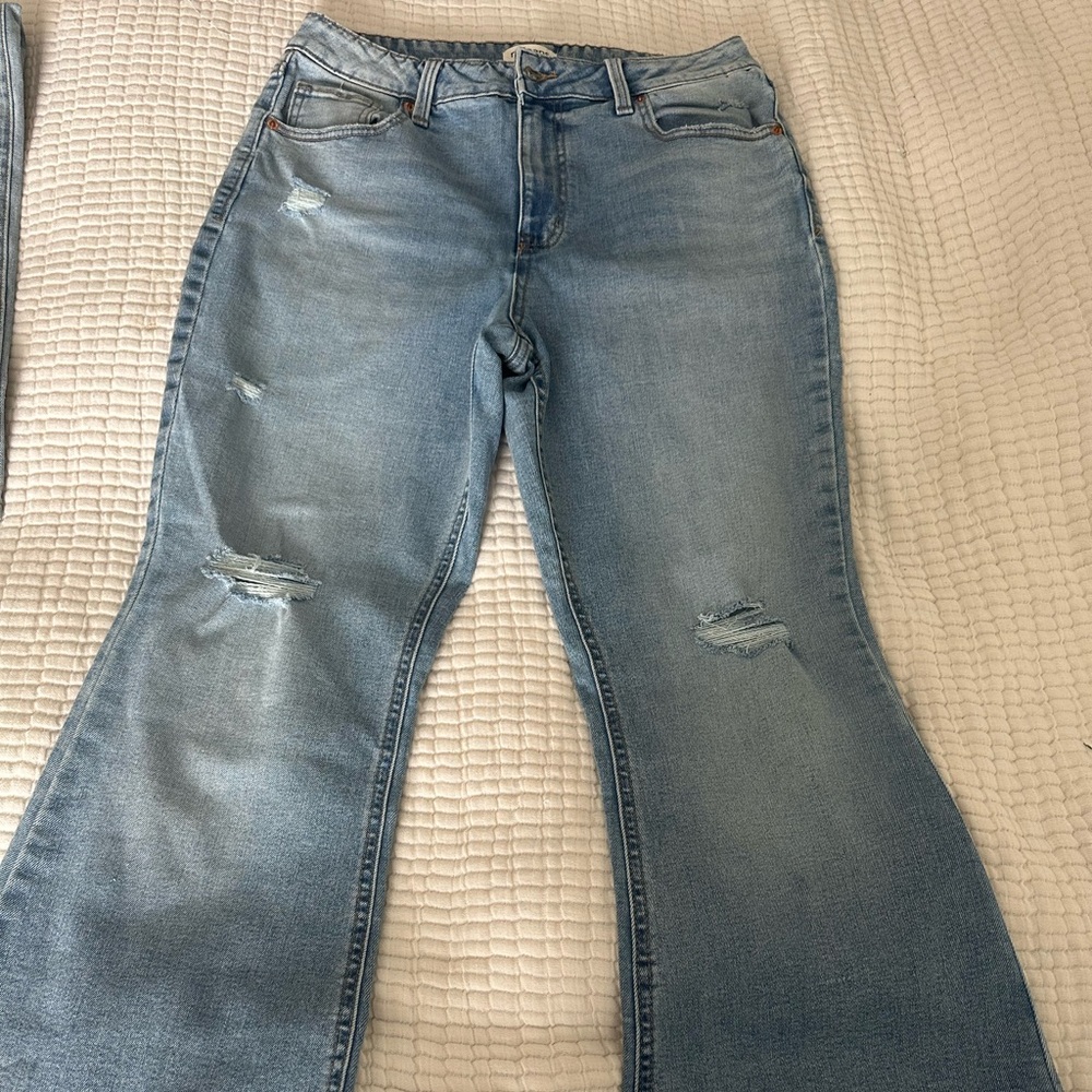Women's distressed flare legged jeans from Maurices